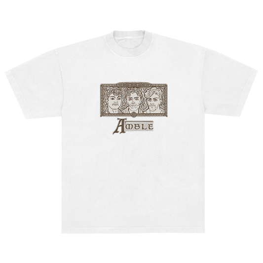 White t-shirt with graphic design featuring three faces and the word 'Amble' on a white background